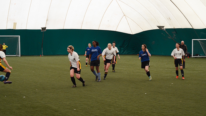 sports team playing inside air dome