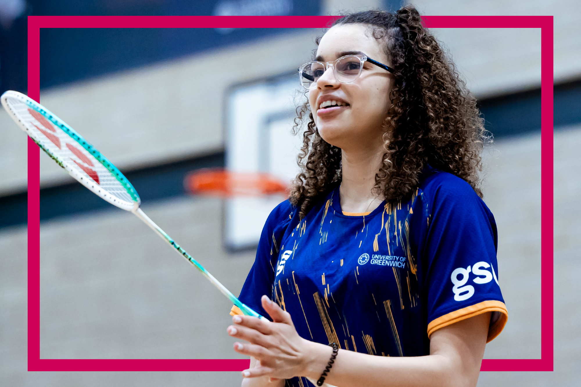 Image of a female student holding a badminton racquet