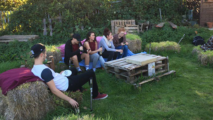 Students sat in the edible garden