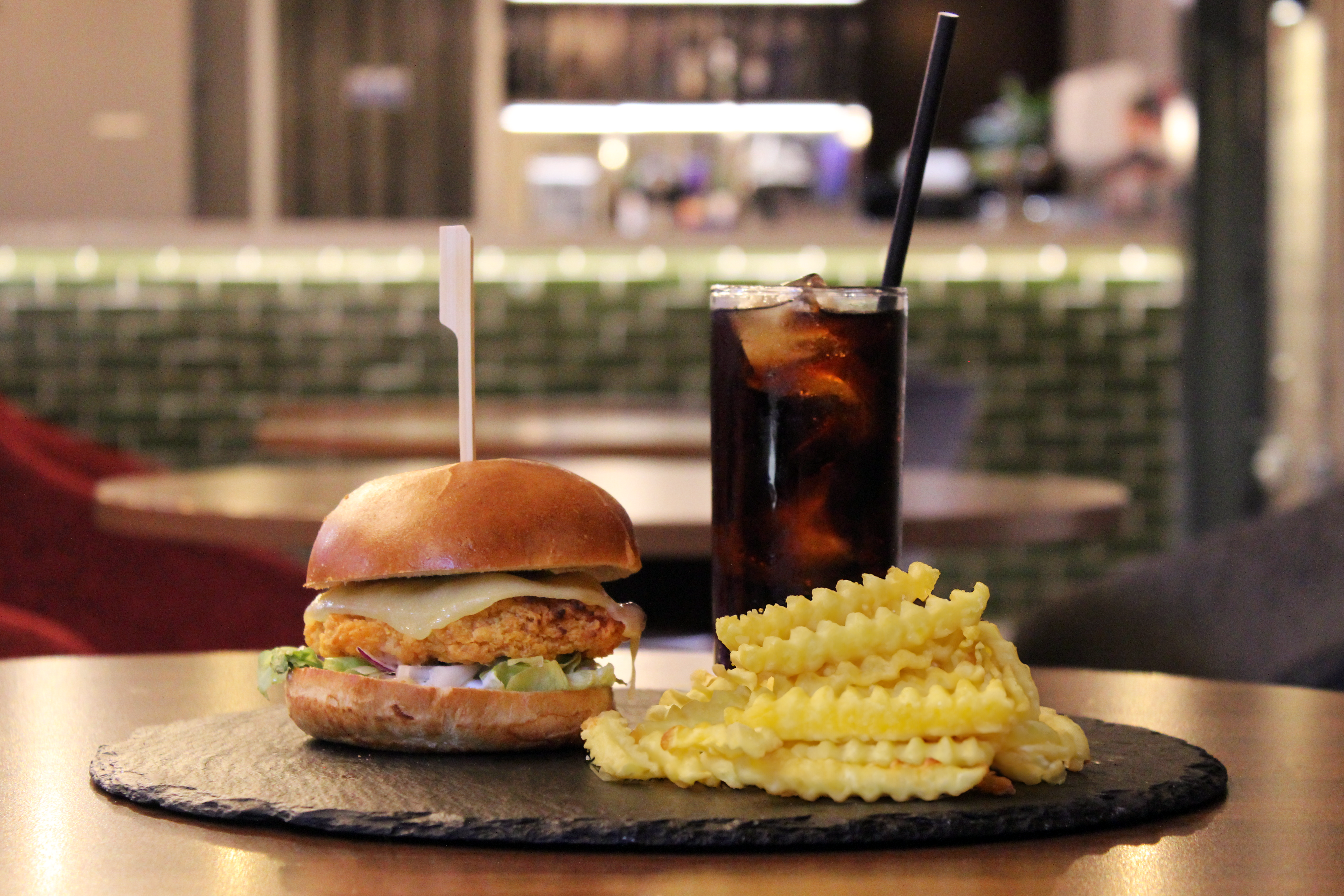 chicken burger with fries and a coke