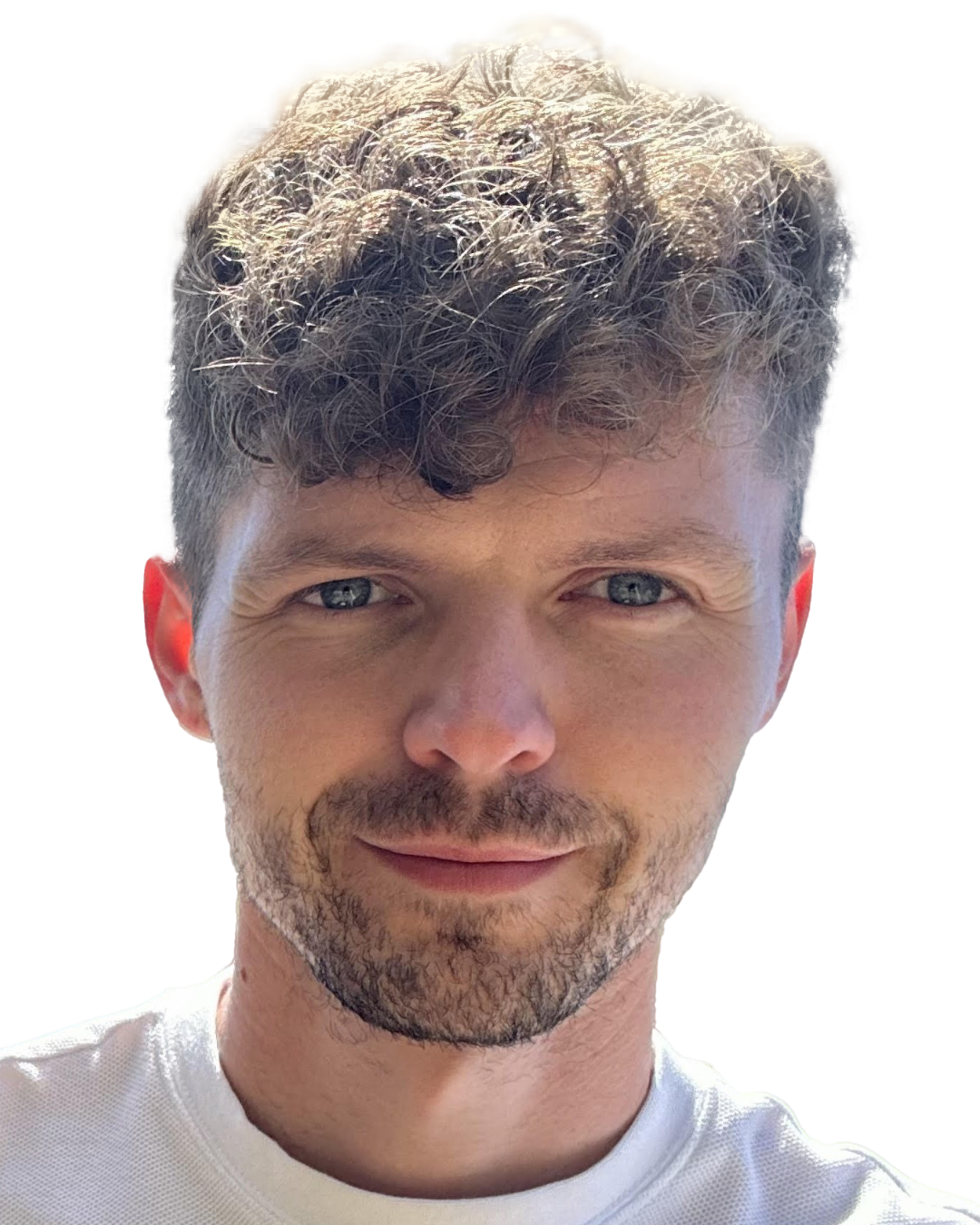 Billy smiling into the camera with a plain white background