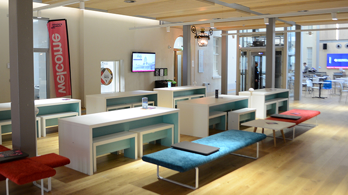 Open space with tables and benches set up